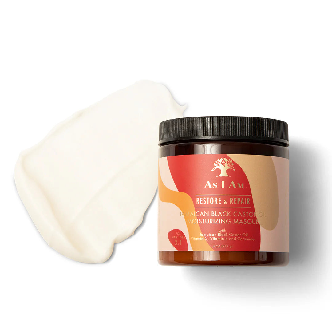 As I Am Jamaican Black Castor Oil Moisturizing Masque met romige textuur zichtbaar naast de pot, perfect voor intensieve hydratatie.