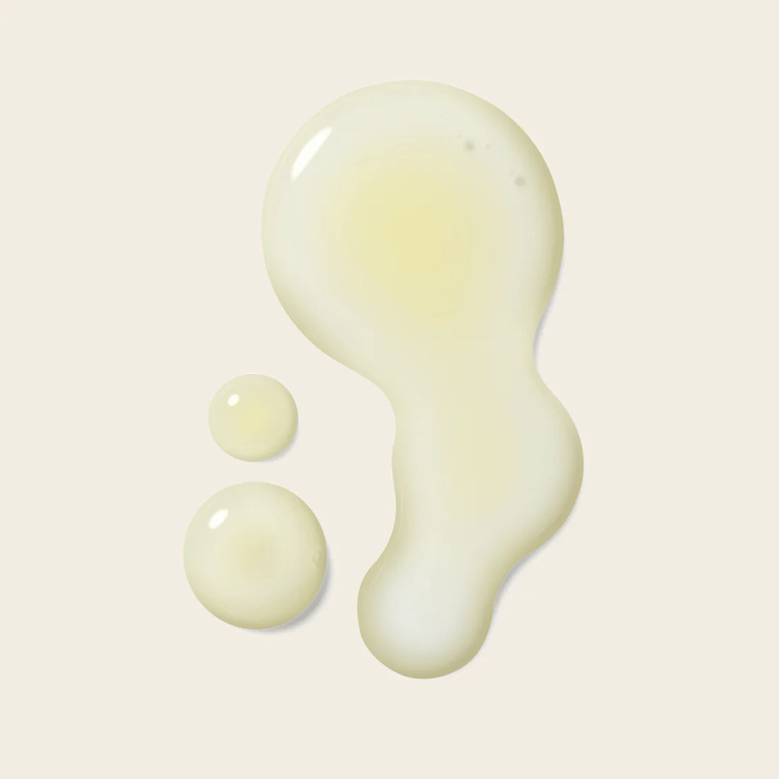 Textuur van Bouclème Revive 5 Hair Oil, lichtgewicht olie met glanzende finish voor gezonde krullen zonder verzwaring.