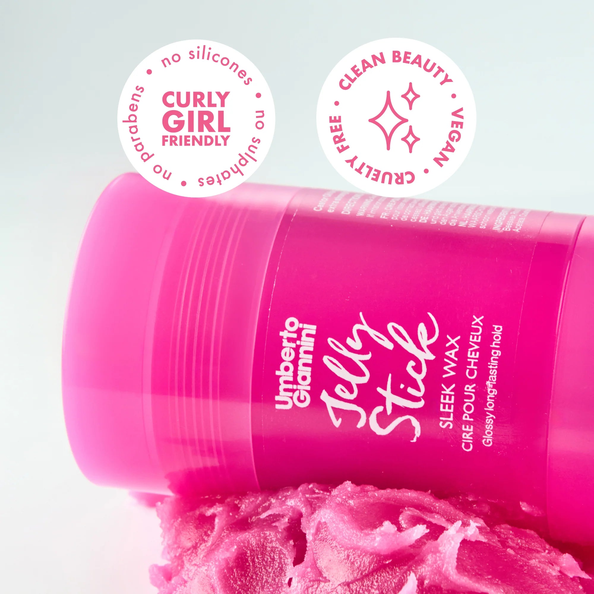 Umberto Giannini Jelly Stick met roze waxtextuur, vegan, CG-vriendelijk en vrij van siliconen en parabenen. Clean beauty haarstyling.