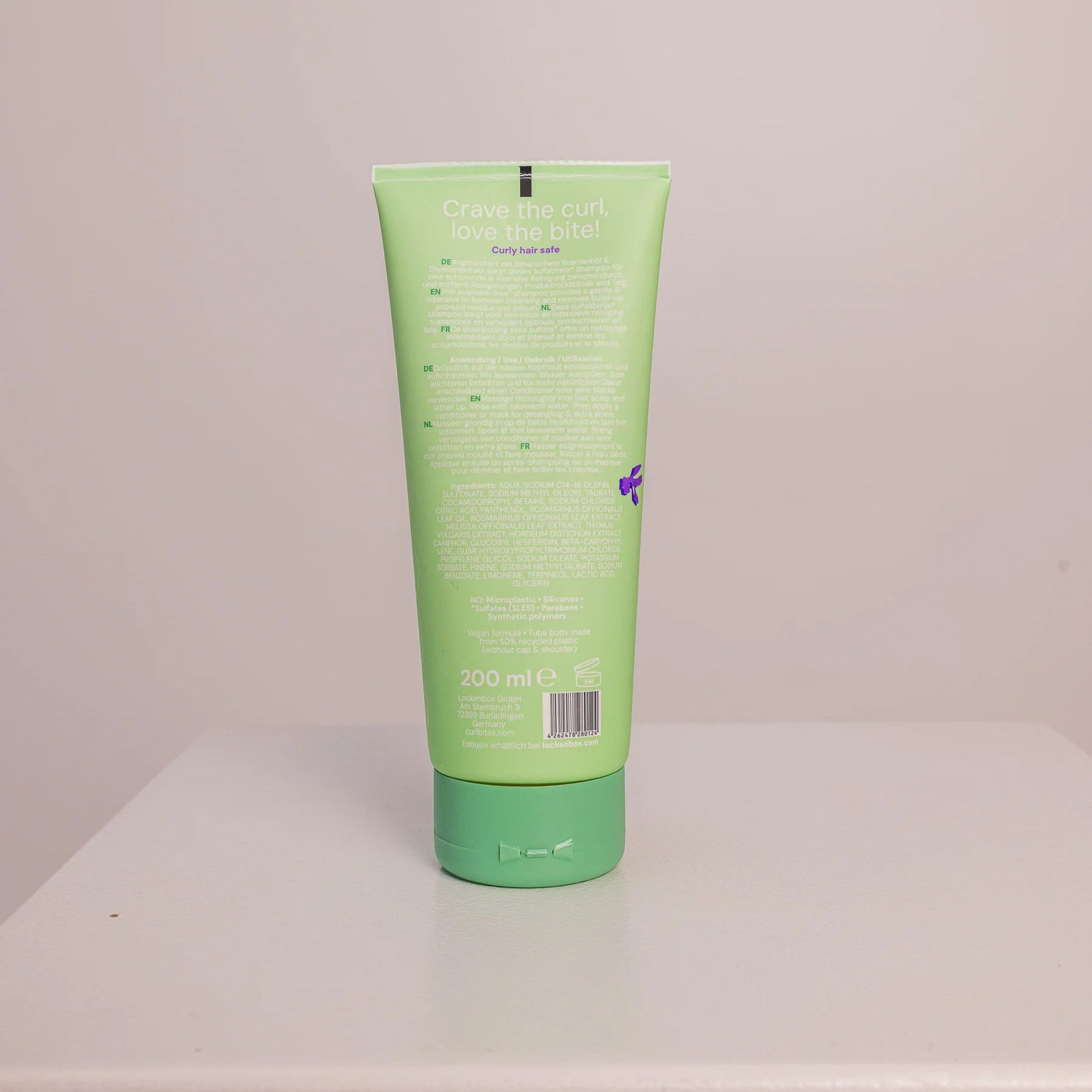 Achterkant van Curl Bites Rosemary Deep Cleansing Shampoo 200ml met gebruiksaanwijzing en ingrediëntenlijst, geschikt voor krullend haar zonder proteïne.