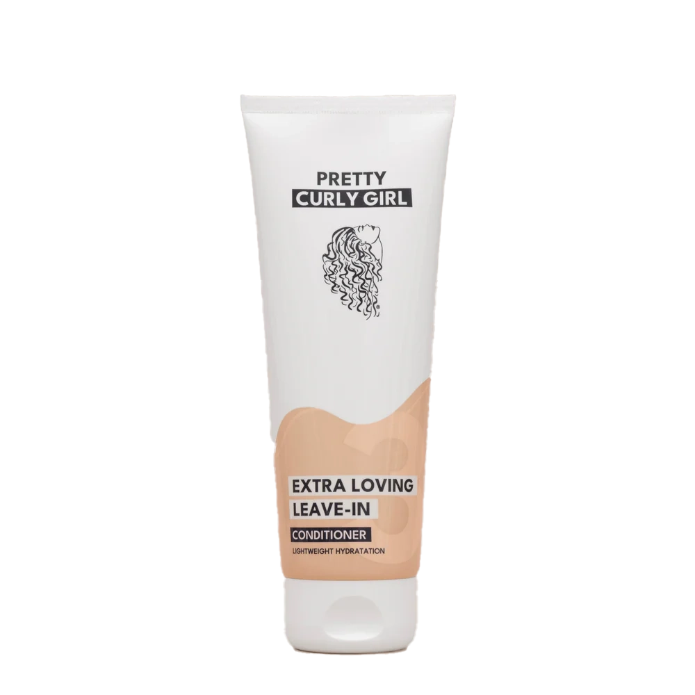 Pretty Curly Girl Extra loving leave-in Conditioner in witte tube met zwarte tekst, ideaal voor CG methode en proteïnevrij haarverzorging.